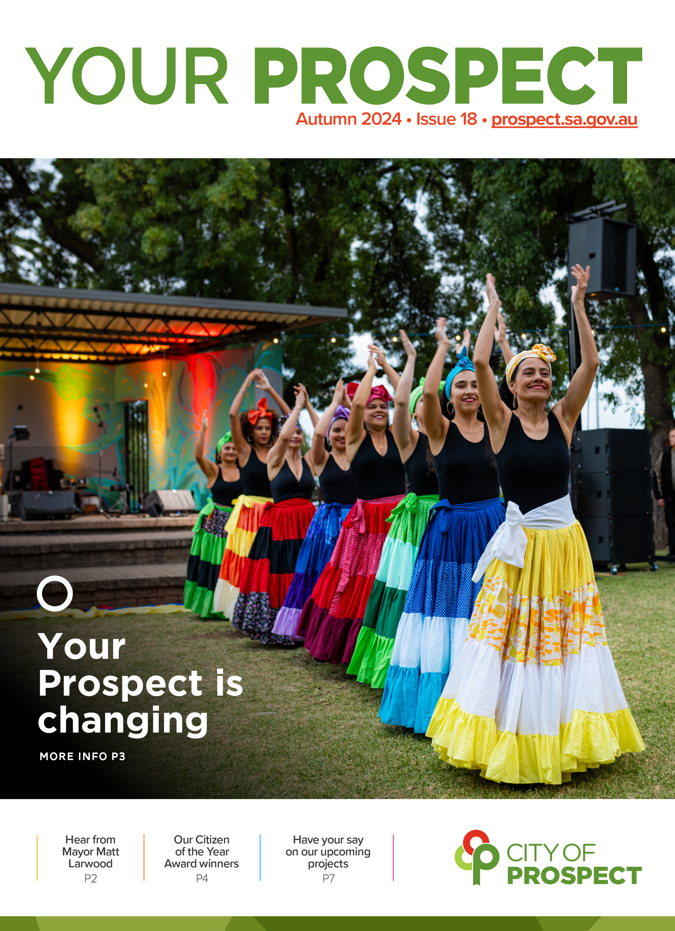 Front cover of Issue 18 with a group of women dancing in colourful skirts